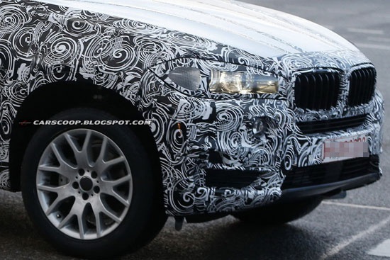 BMW X5 2014 постепенно обнажается